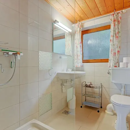 Quaint Chalet With Garden Terrace Fireplace Play Equipment شاليه Iselsberg